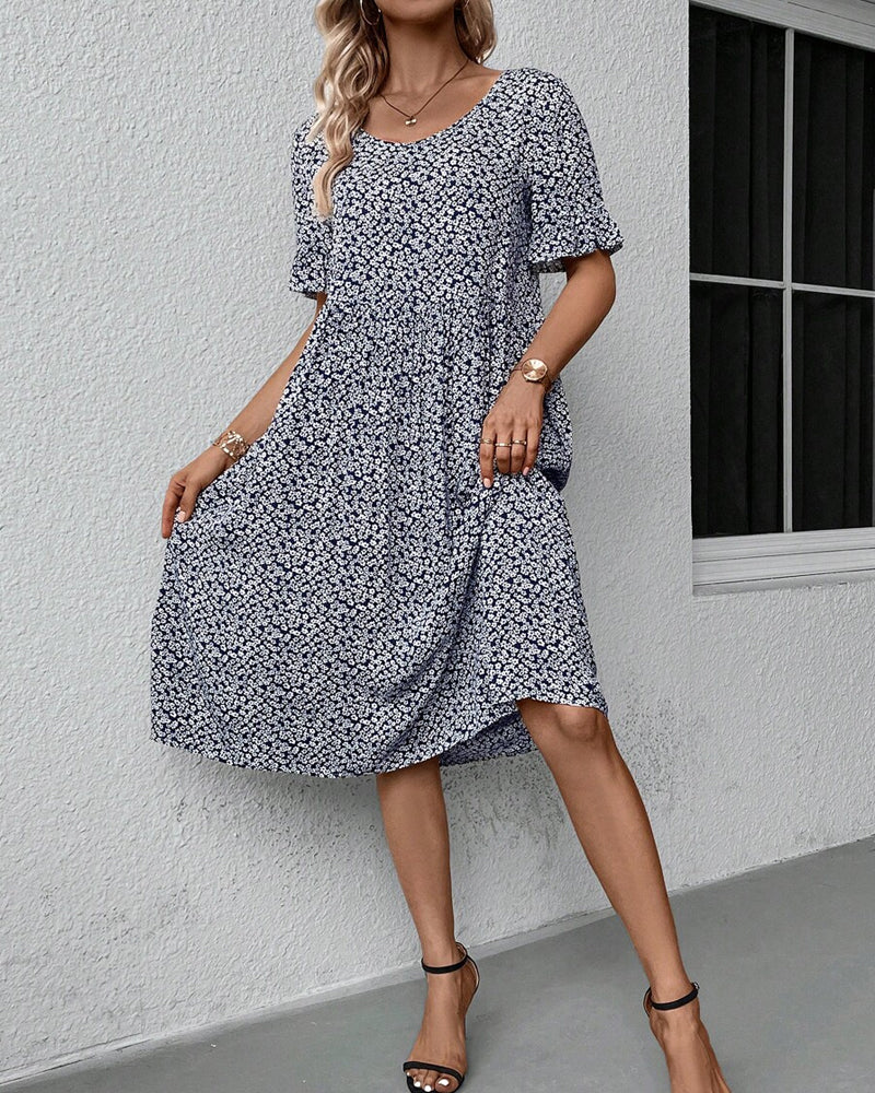 Damen-Midikleid_mit_Blumenmuster_kurzen_rmeln_und_Rundhalsausschnitt.jpg