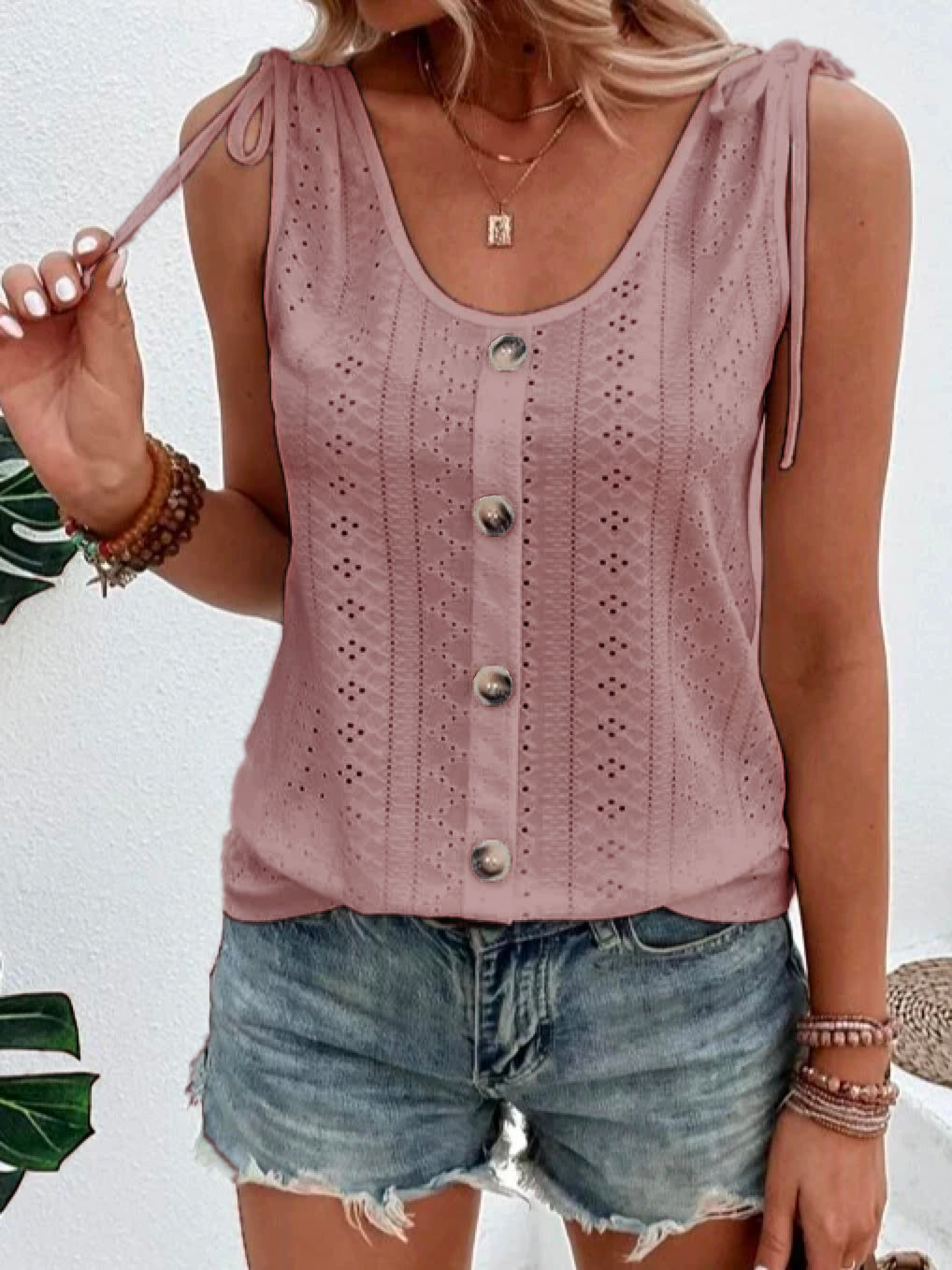 Ärmellose Ösenbluse für Damen mit Bindebändern und Knöpfen
