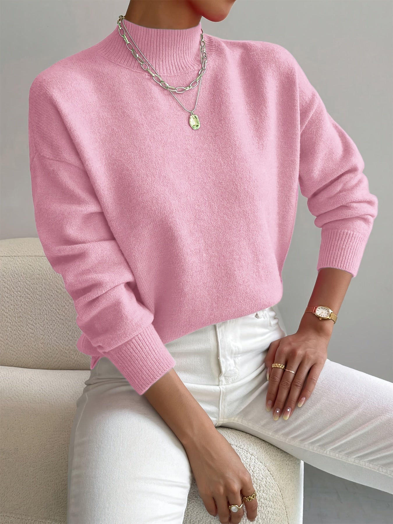Women's roll-neck sweater with ribbed cuffs and long sleeves