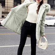 Women's winter coat with faux fur hood and zipper