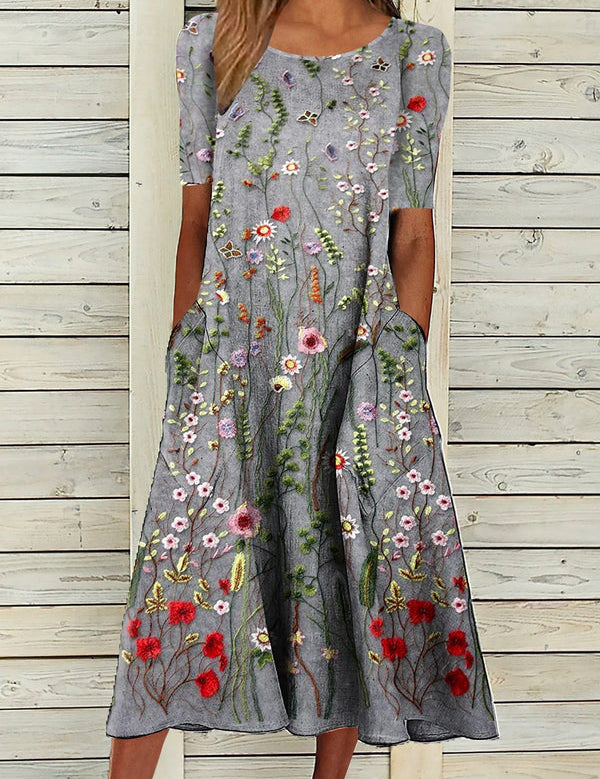 Damen_Midikleid_mit_Rundhalsausschnitt_und_Floral_Print.jpg
