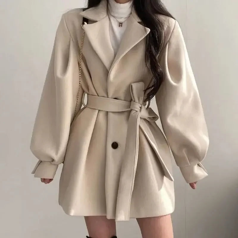Women's trench coat with belt and puff sleeves