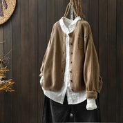 Women's oversized cardigan with button closure and front pocket