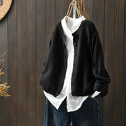 Women's oversized cardigan with button closure and front pocket
