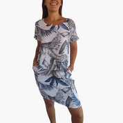 Freizeitkleid mit Blumendruck, kurzen Ärmeln und Taschen für Damen
