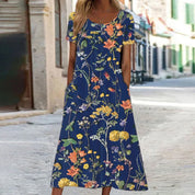 Geblümtes Maxikleid für Damen mit kurzen Ärmeln und Seitentaschen