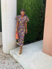 Midi-Kleid für Damen mit Puffärmeln, figurbetontem Schnitt und gedrehter Taille
